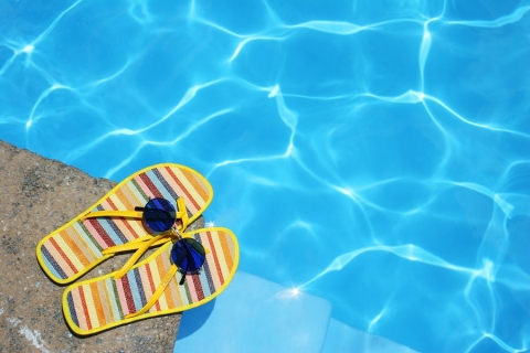 Striped flip-flops by poolside