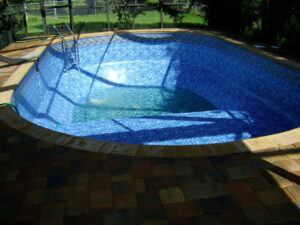 Pool with a blue liner in sunlight