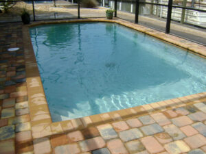Rectangular pool with brick deck
